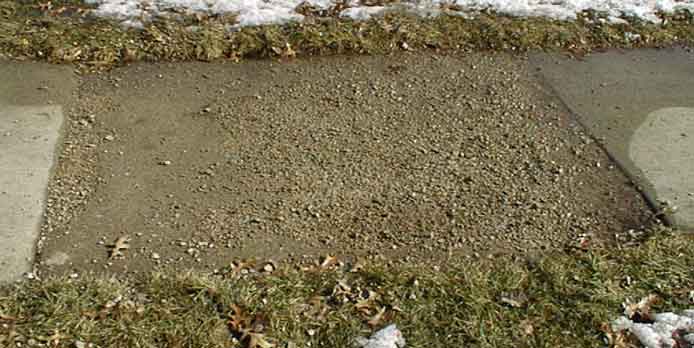 a slab of concrete showing deterioration