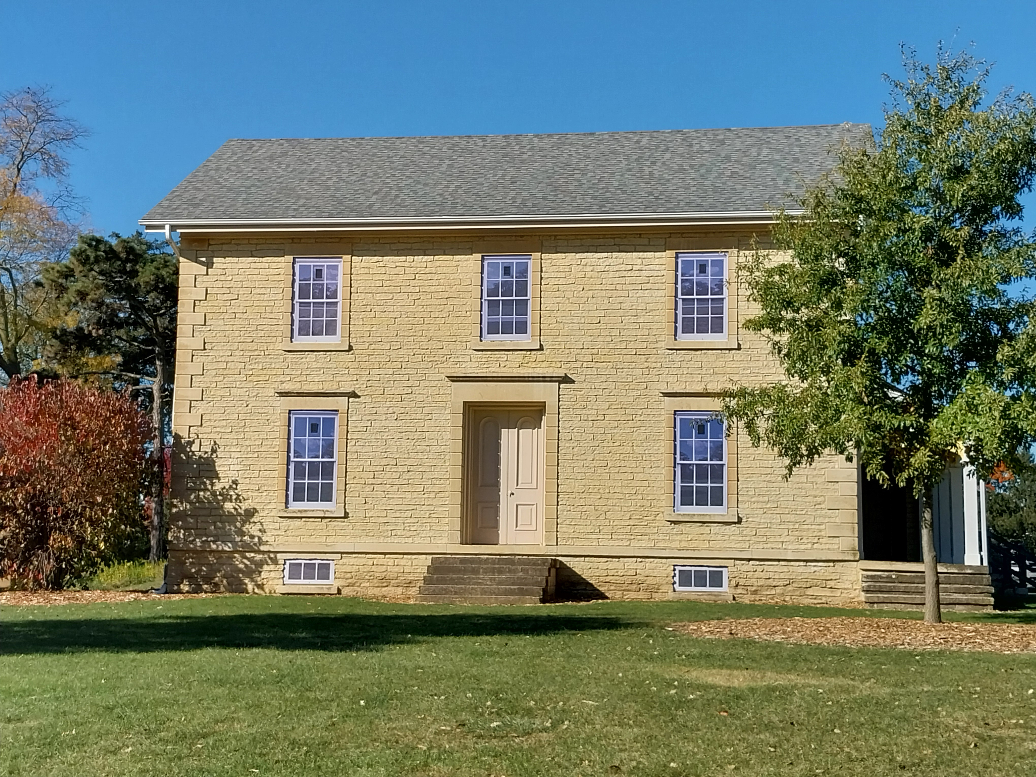 a light brick two-story home