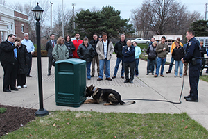 Residents watch K-9 Niko (now retired) demonstrate his skills with his handler