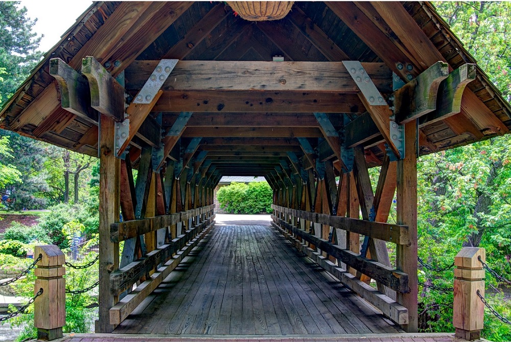 a wooden covered bridge over the DuPage River