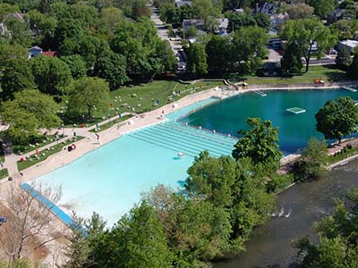 aerial view of Centennial Beach swimming area surrounded by trees